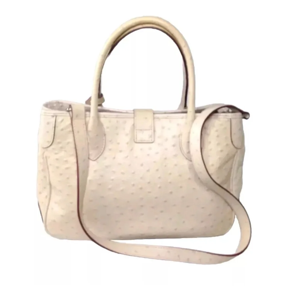 Dooney & Bourke Butter Yellow Ostrich-Embossed Satchel with lilac dots